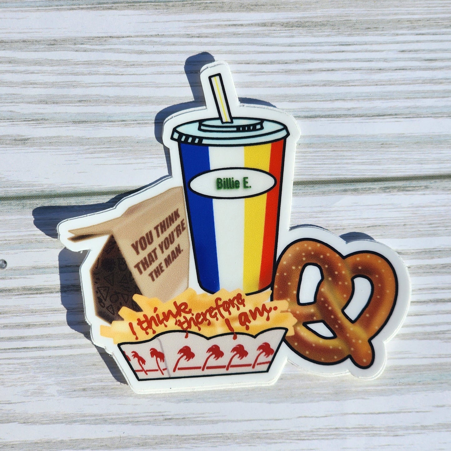 Hand-drawn sticker referencing Billie Eilish’s 'Therefore I Am' – includes fast food scene with lyrics on chip bag and ketchup dripping from fries.